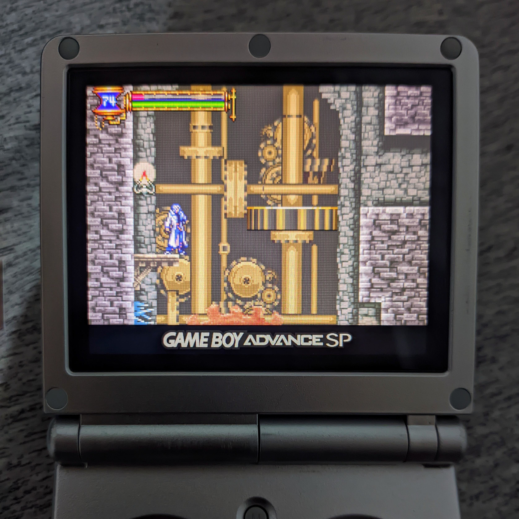 The clock tower, one of my favorite areas in the game, being played on my Anbernic RG35XX SP